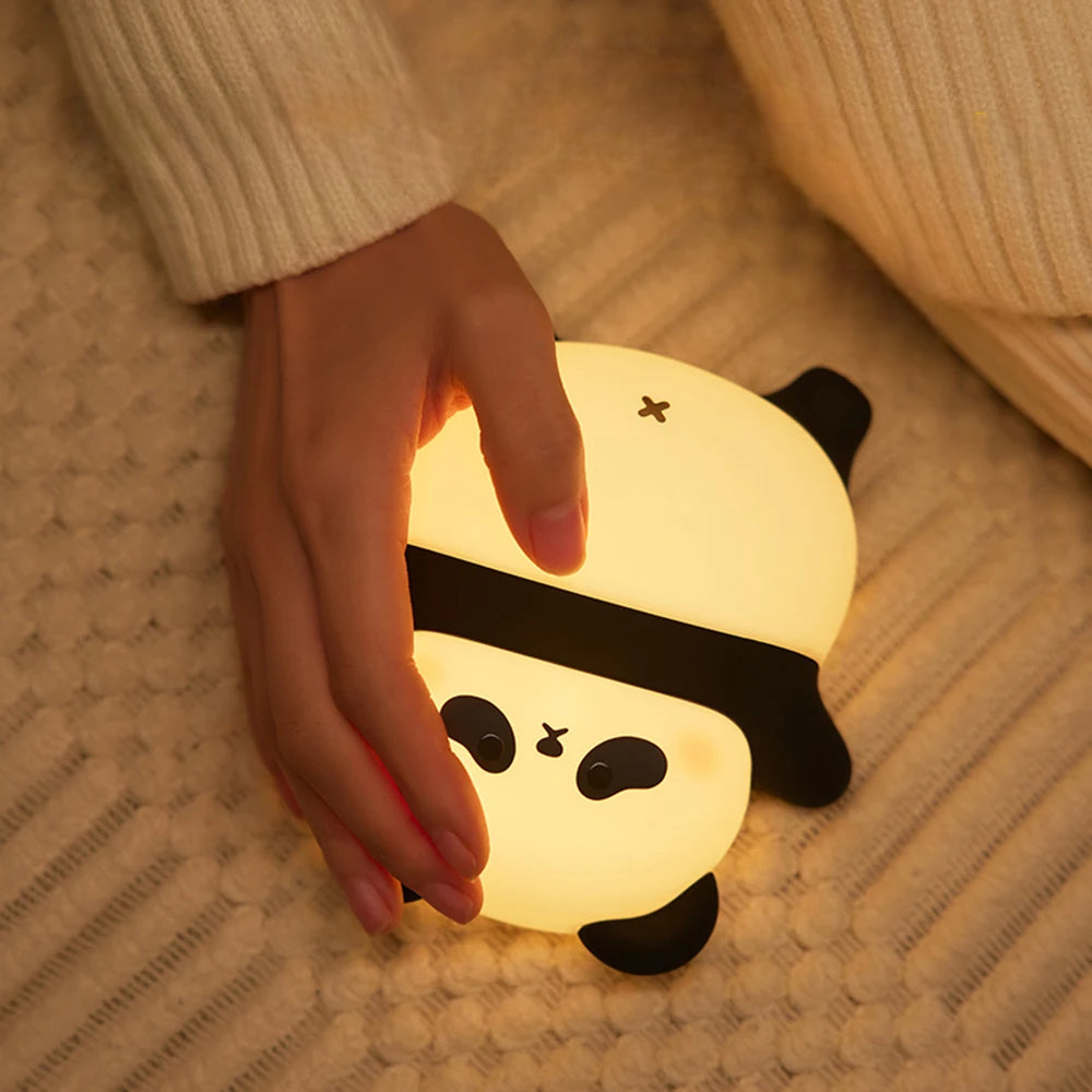 Panda Shaped LED Lamp illuminating a child's bed