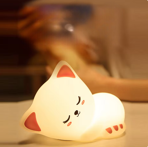 LED Night Light Lamp Kitten laying on a bed