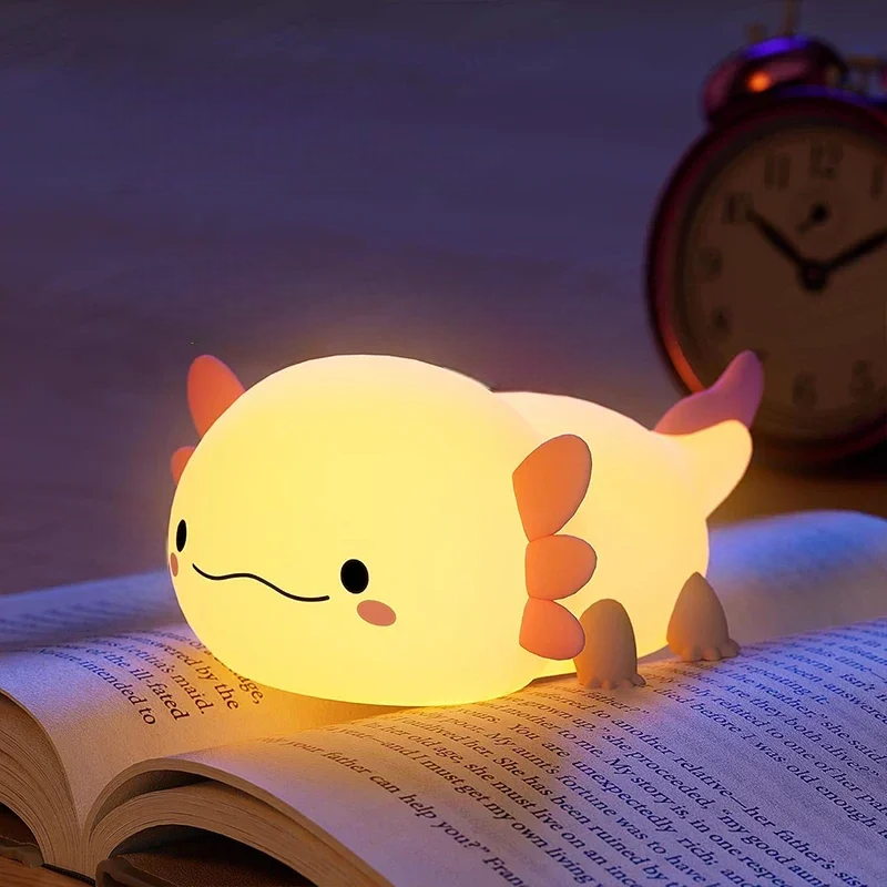 Axoltl Shaped LED Lamp on a Book