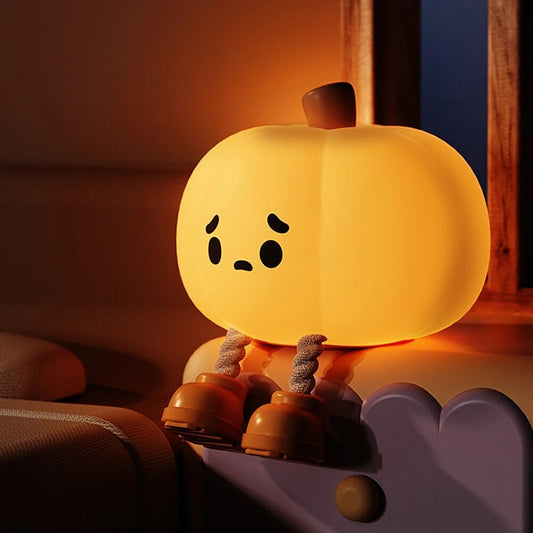 LED Night Light Lamp Pumpkin looking sad sitting on a bench