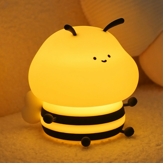 Bumble Bee LED Night Light Glowing on a Bed