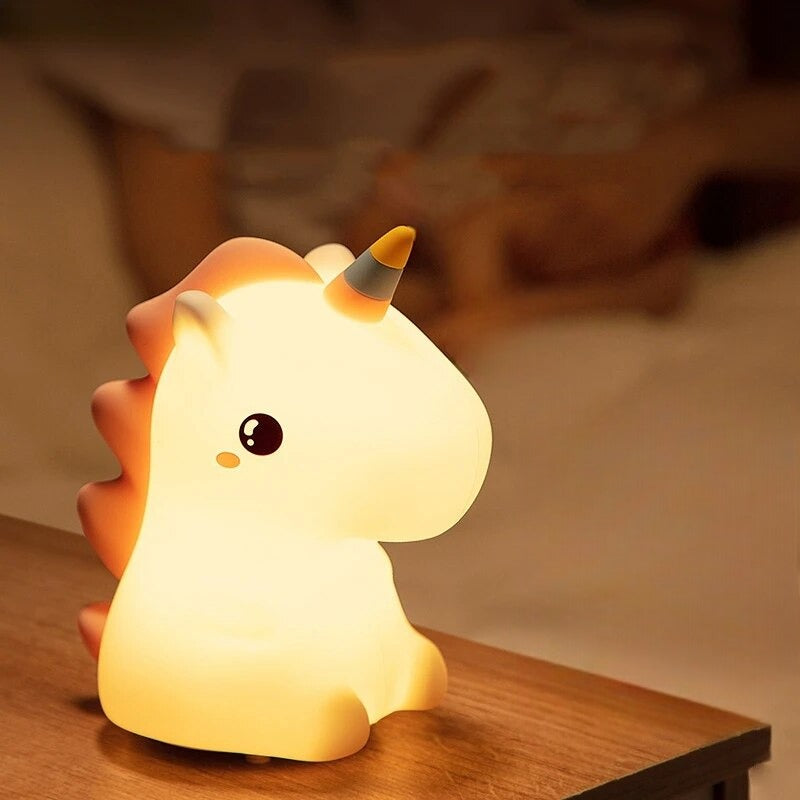 LED Unicorn Table lamp illuminating a bedroom
