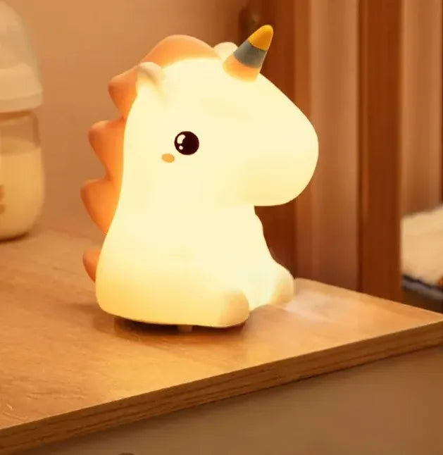 Unicorn LED lamp illuminating a bedside table