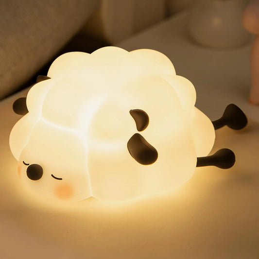 Glowing LED Lamp Shaped like a Sheep on a bedside table